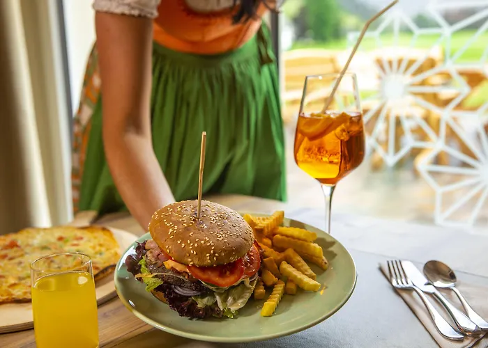 Отель Cooee Alpin Dachstein Гозау